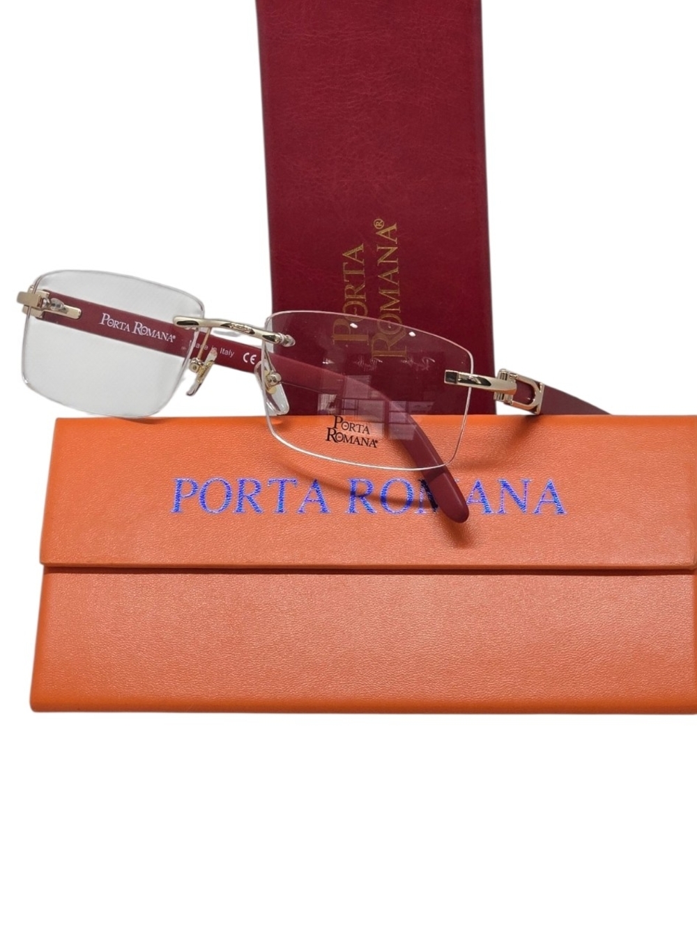 Porta Romana Rimless Eyeglasses in red wood and Gold